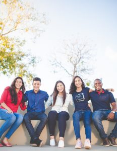Group of diverse teens sitting together and smiling. This group has been enjoying time together now that some have overcome anxiety. If you're wanting to help your teen overcome their anxiety, then teen counseling can help. Briefly Counseling is an online therapy practice that offers teen counseling for confidence, stress, perfectionism, and OCD. Therapy for teens in Illinois is a great place to start. Begin today!