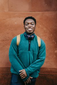 Picture of black teen in blue sweater smiling. You want to help your teen with anxiety, but they need to deal with anxiety symptoms themselves. Working with an anxiety therapist is a good next step for guidance. Begin online anxiety counseling for teens with anxiety in Chicago, Champaign, or anywhere in Illinois.